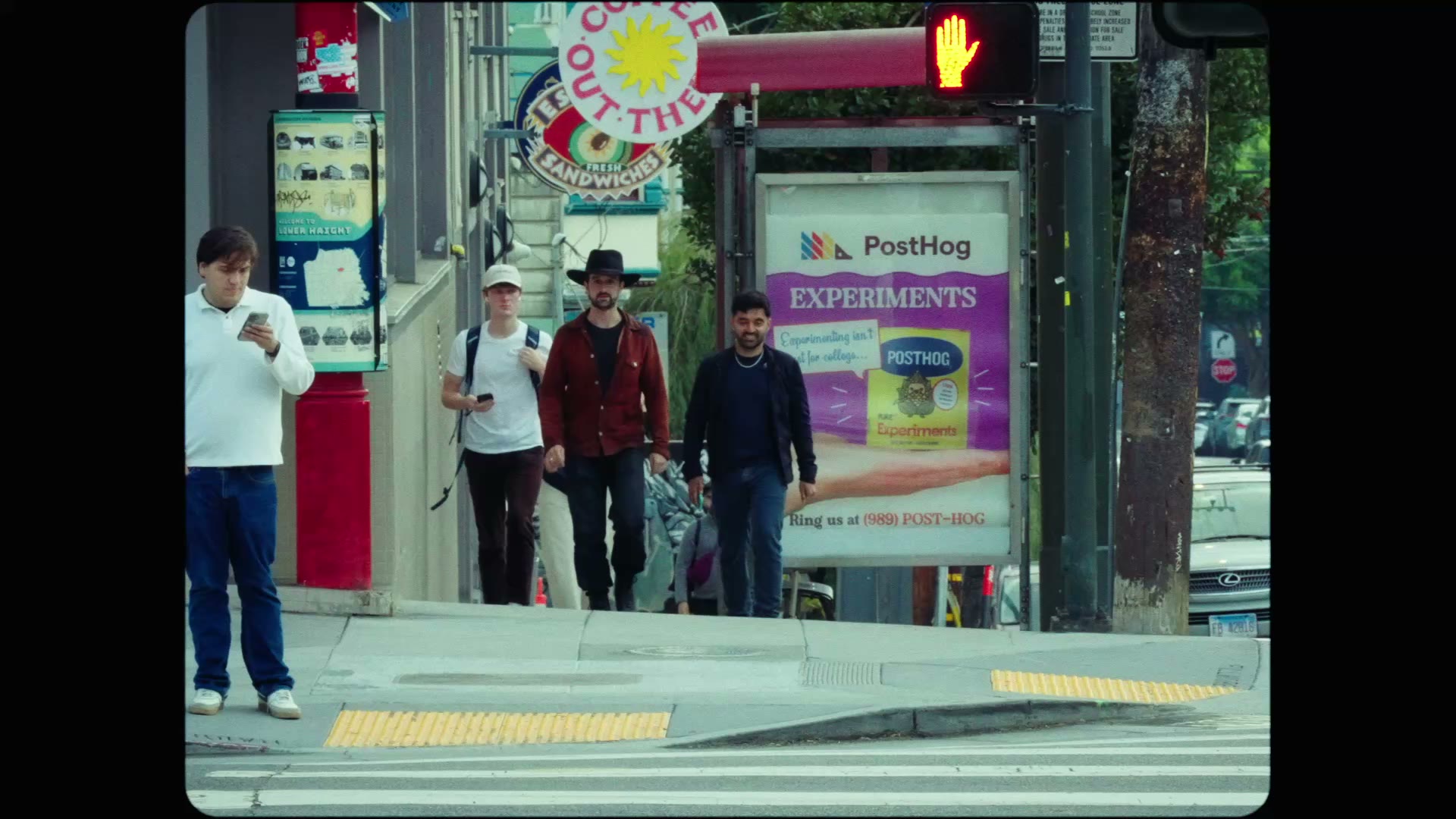 The two founders walking toward the camera on Haight Street, the opening frame of their film.